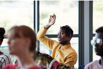 man raising hand